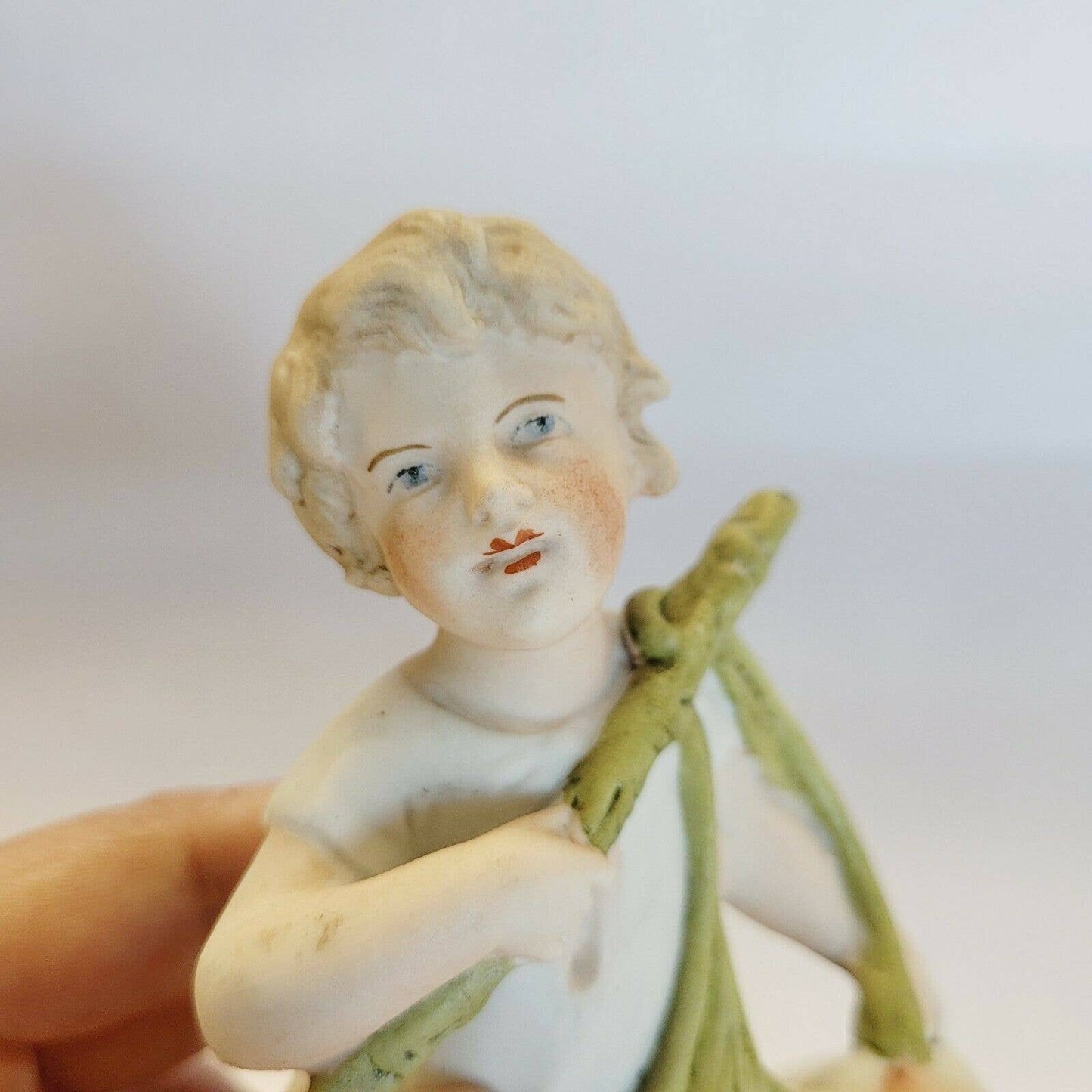 Antique Porcelain Bisque Boy with Peaches Planter 5 1/4" Figurine.