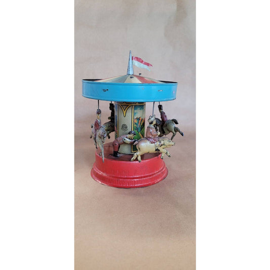 Antique Gunthermann tin toy Carousel